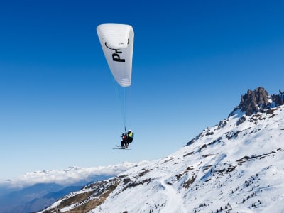 Tandem Ski Paragliding Flight in Méribel from the Summit of Saulire