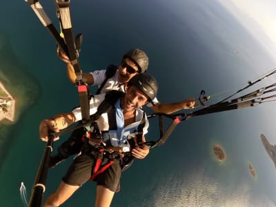 Tandem paragliding flight in the Gulf of Itea at 2000m, Greece