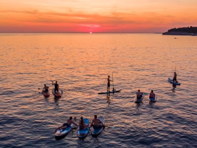 Tour des îles en Stand-up Paddle au coucher du soleil depuis la plage d'Histria, Pula