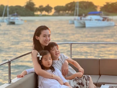 Sunset yacht cruise along Singapore's coastline