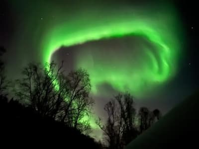 Randonnée nocturne en raquettes à Ivalo avec feu de camp et aurores boréales