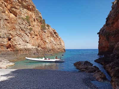 Private Boat Tour to Menies Beach and the Caves of Rodopou Peninsula from Chania in Crete