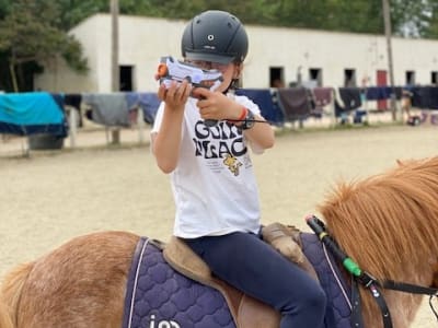 Laser Game a caballo cerca de Saint-Cyprien