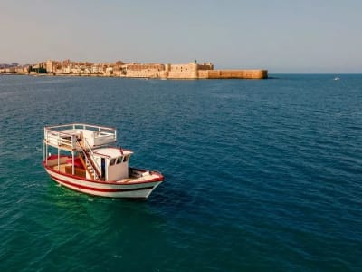 Paseo en barco al atardecer y aperitivo desde Siracusa a la isla de Ortigia, Sicilia