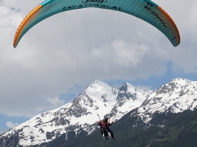 Tandem paragliding flight over Stubai Valley in Elferlifte, near Innsbruck