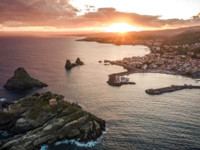 Sunset Boat Tour and Dinner to the Cyclopean Isles from Aci Castello, Sicily