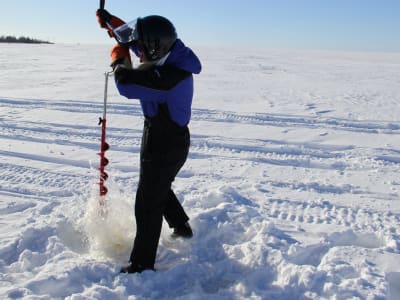 Snowmobile and Ice Fishing Experience on the Bothnian Bay from Kemi