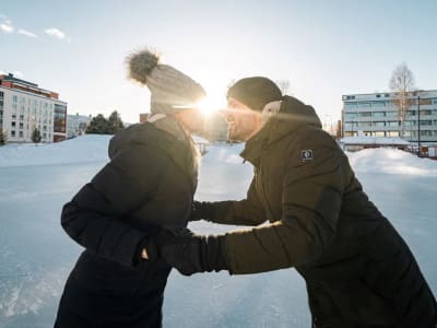 Private Couple Photo Session and Ice Skating Excursion in Rovaniemi 