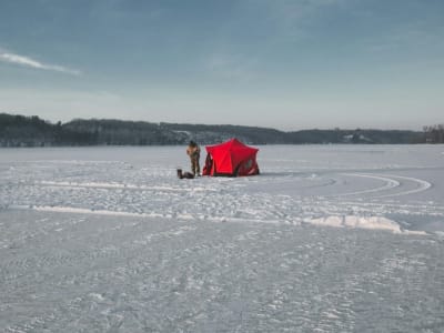 Private ice fishing excursion in the Alaskan wilderness, near Anchorage