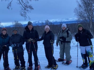 Guided family snowshoe hike in the Alaskan wilderness, near Anchorage