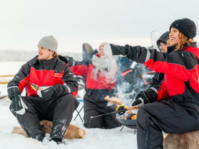 Ice Fishing Excursion by Snowmobile from Rovaniemi