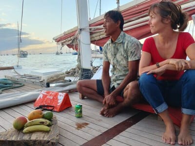 Sunset Excursion in a Double Sailing Pirogue in the Tahiti Lagoon with Snorkelling