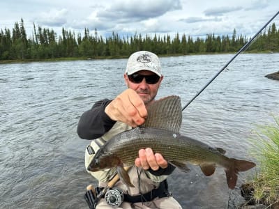 Día completo de pesca en Levi