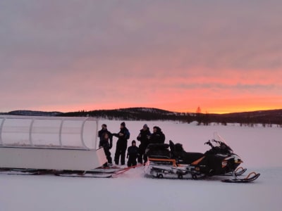 Evening Heated Snowmobile-Pulled Sleigh Ride from Ivalo
