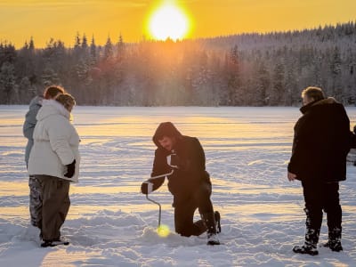 Ice Fishing Excursion on Lake Kuoksa from Rovaniemi