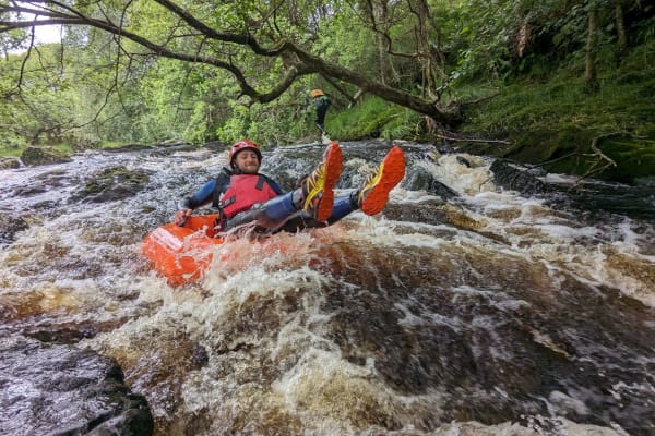 White water Tubing down The River Nith, near Galloway
