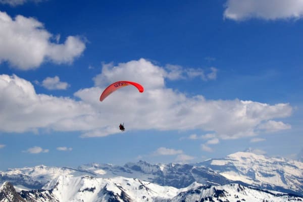 Winter Tandem Paragliding Flight over Les Gets, Portes du Soleil in the Alps