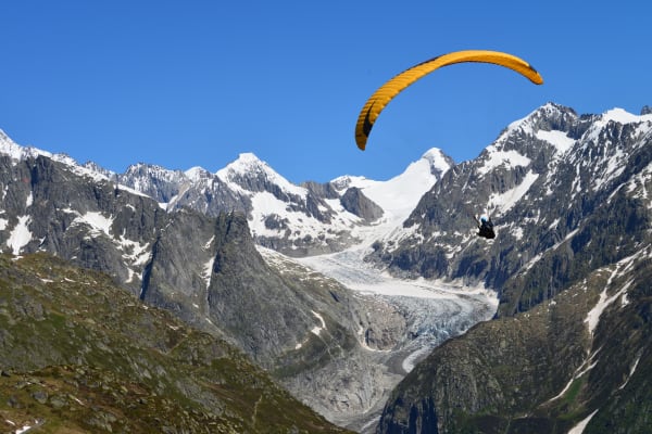 Tandem paragliding over the Aletsch Glacier from Brig, Switzerland