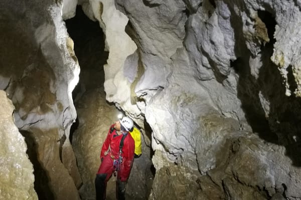 Full day caving excursion and underground crossing of Château d'Oche