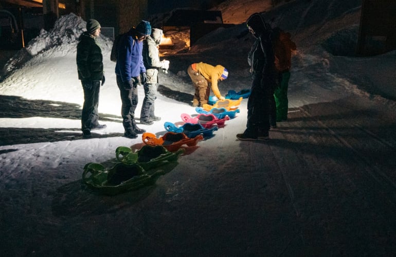 Night snowshoeing and sledging trip to Le Buron, Le Lioran