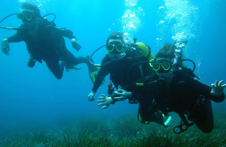 Discover Scuba Diving by boat from Cala en Blanes, Menorca