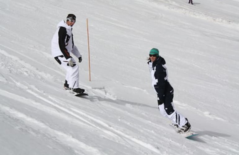 Private snowboard lessons in Super Besse, Massif du Sancy