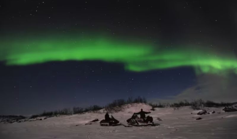 Northern Lights snowmobiling