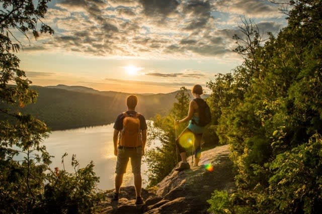 Hikers at sunset