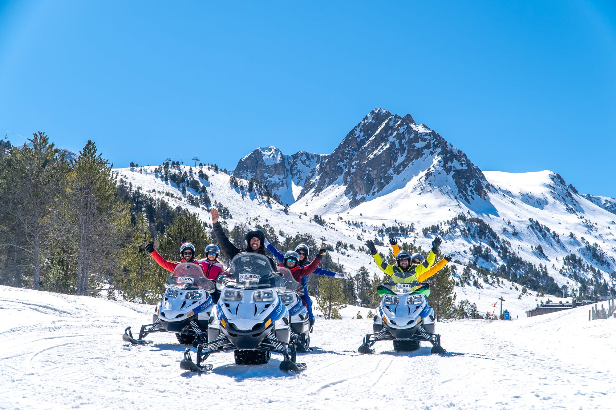 People snowmobiling in Andorra