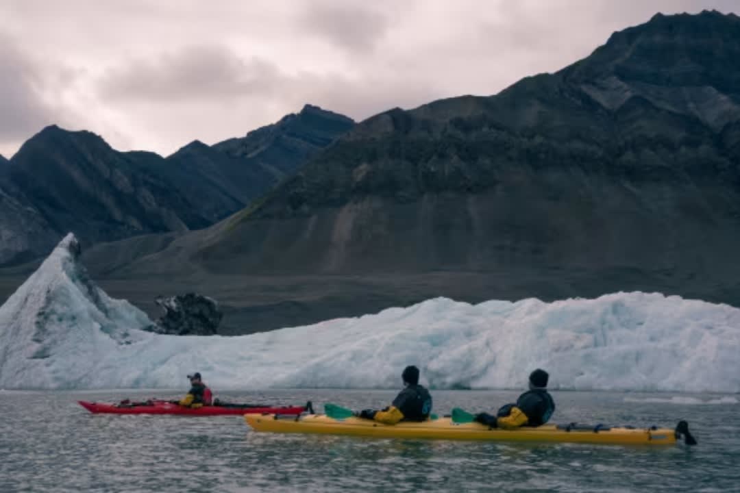 Sea Kayaking along Glacier Fronts in Svalbard, Norway