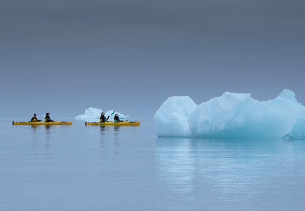 Kayaking along glacier fronts in Svalbard Norway