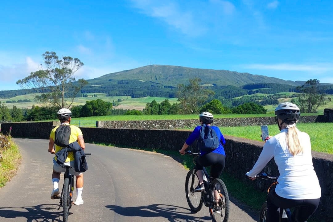 A family doing a Guided E-bike Tour of the West Coast of the island of Terceira, Azores