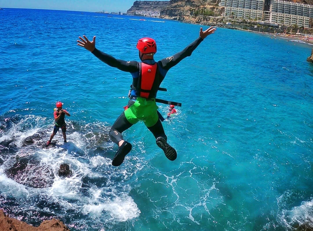 Man jumping into water