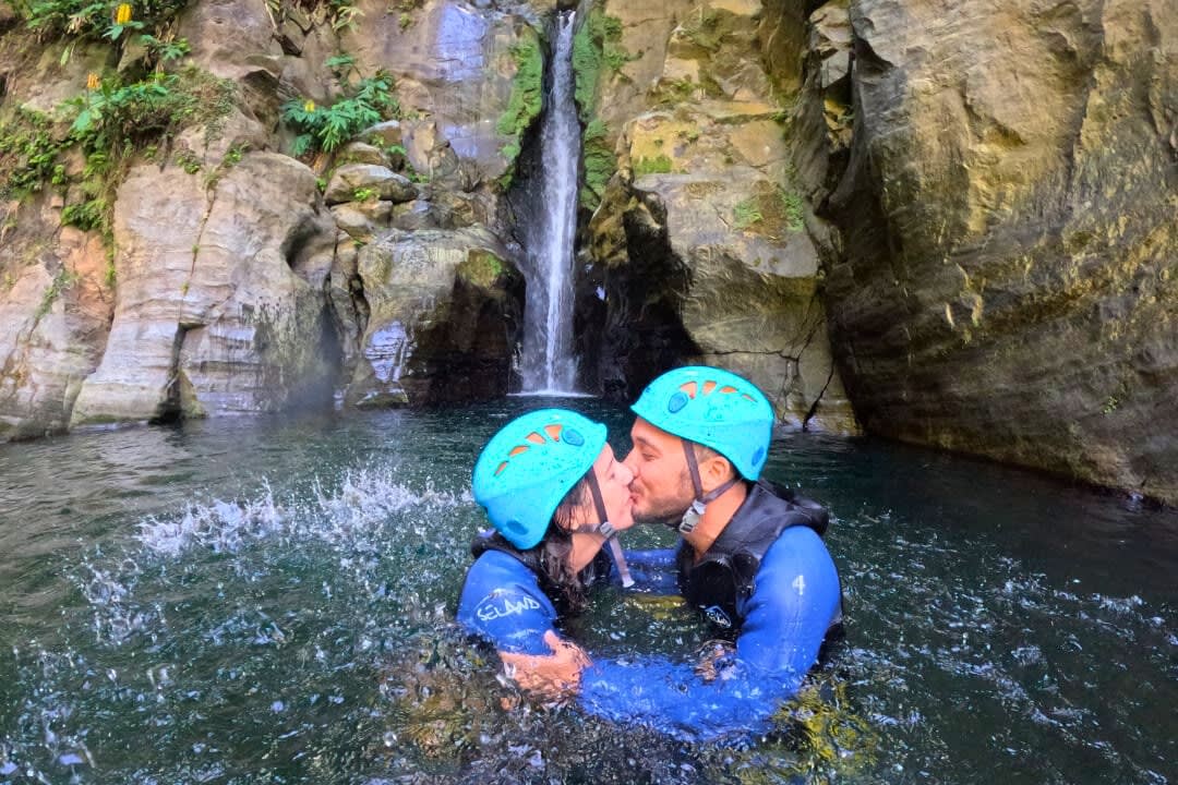 A couple kissing in a Canyon in São Miguel
