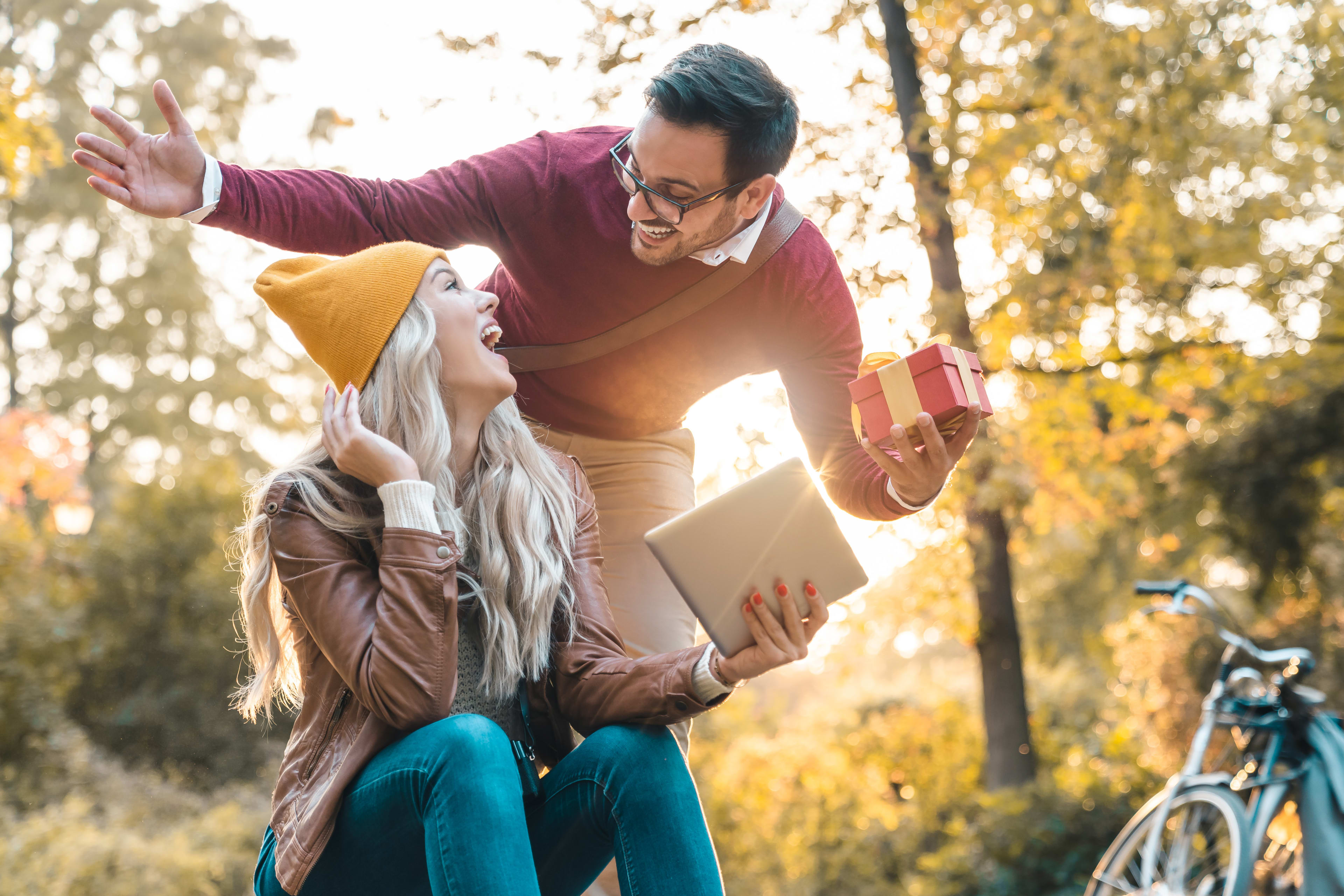 Couple with gifts in the forest