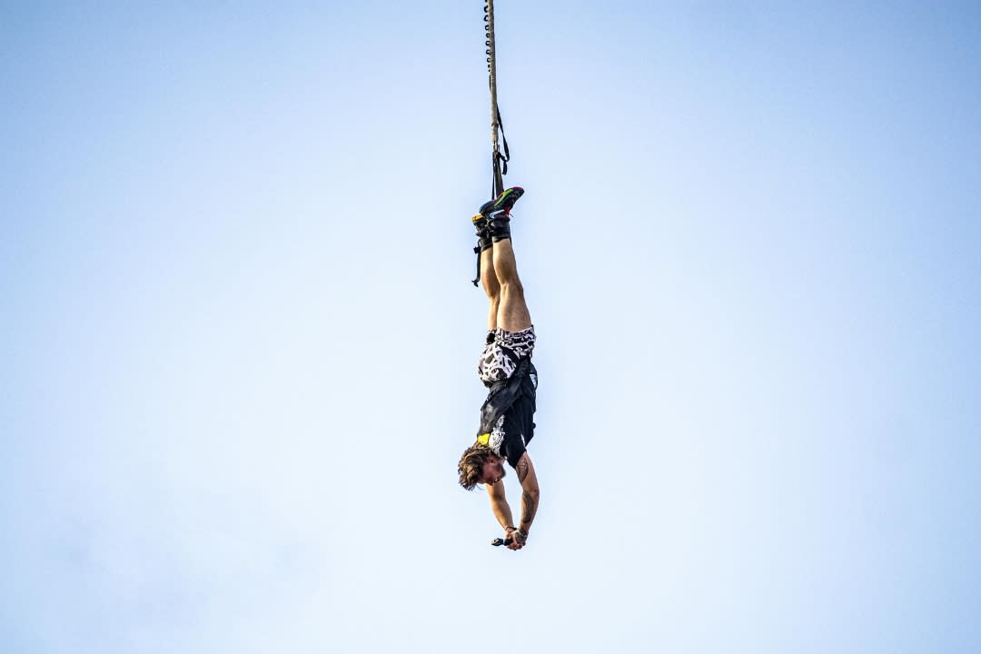 A man doing bungee jumping
