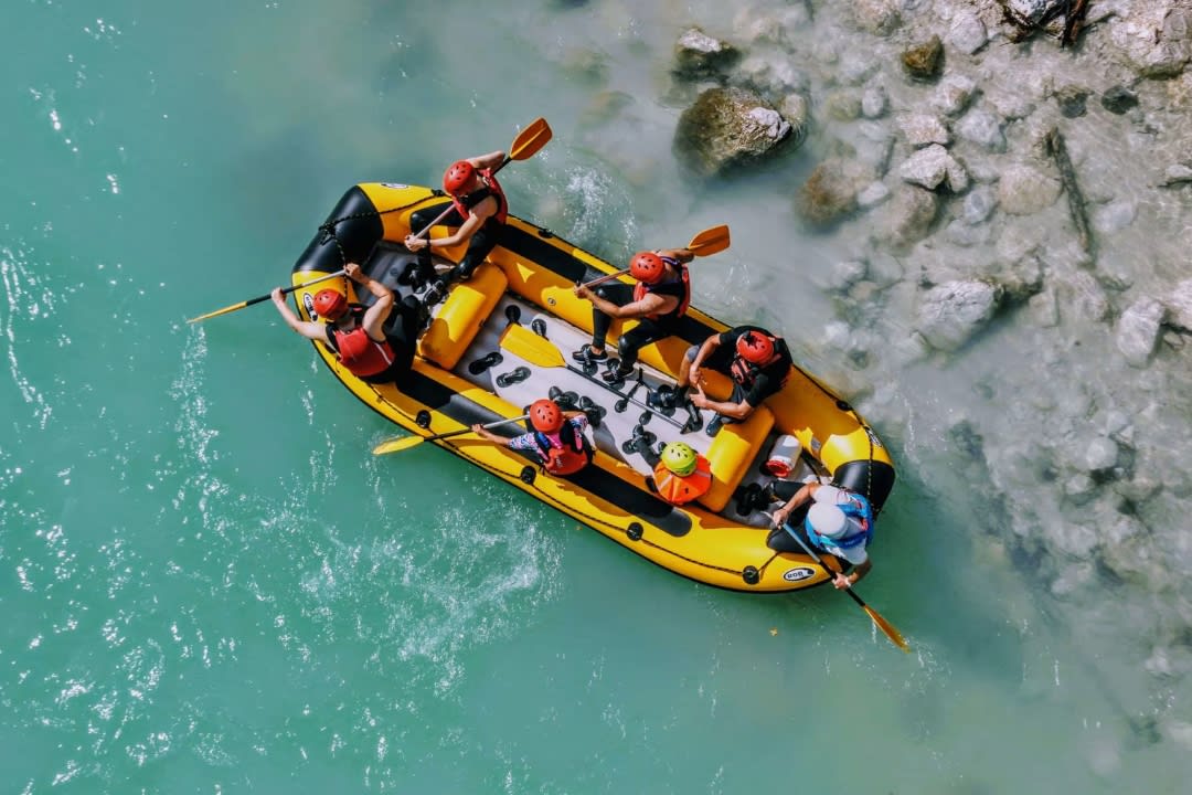Friends Rafting on the Soča River in Bovec