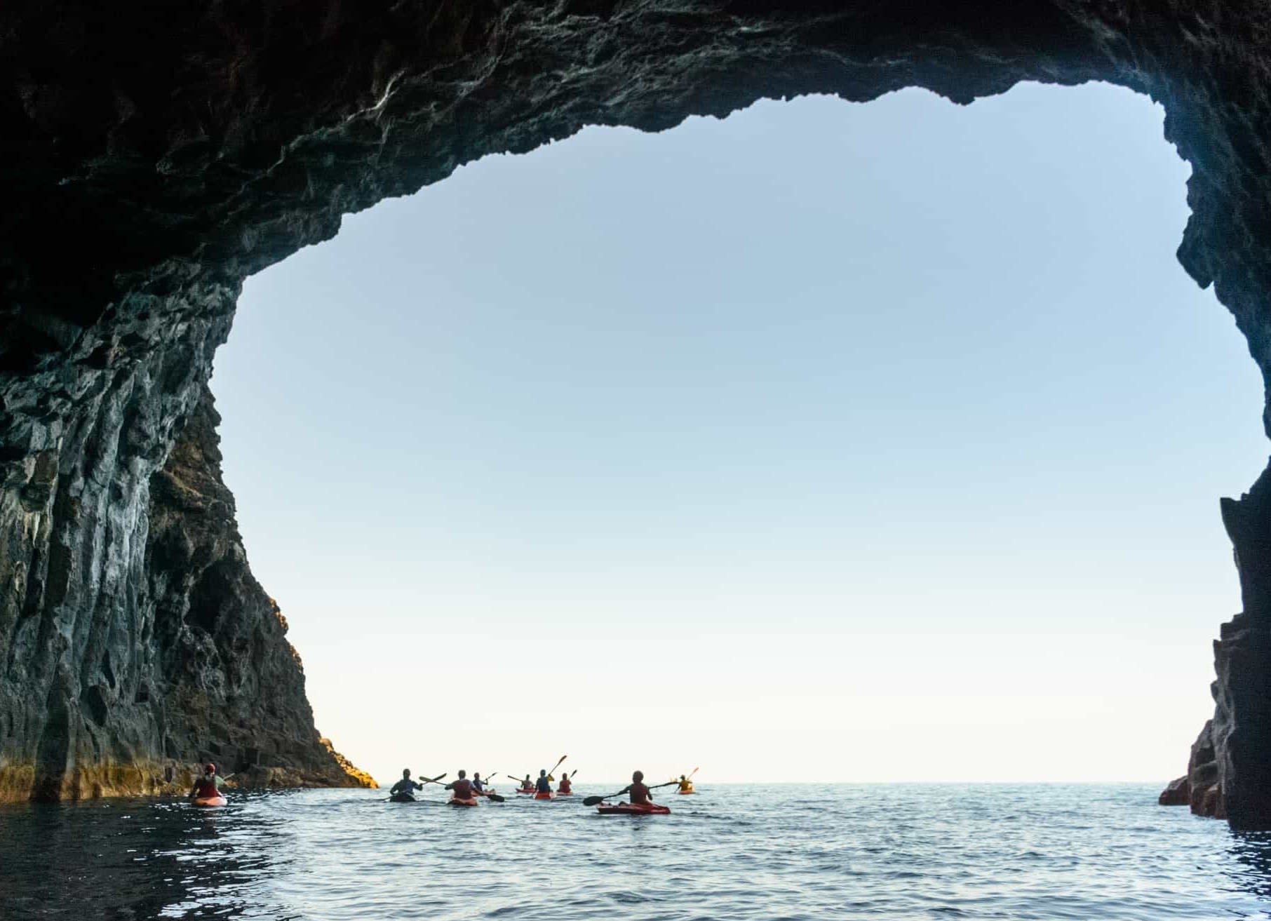 Kayaks in a cave