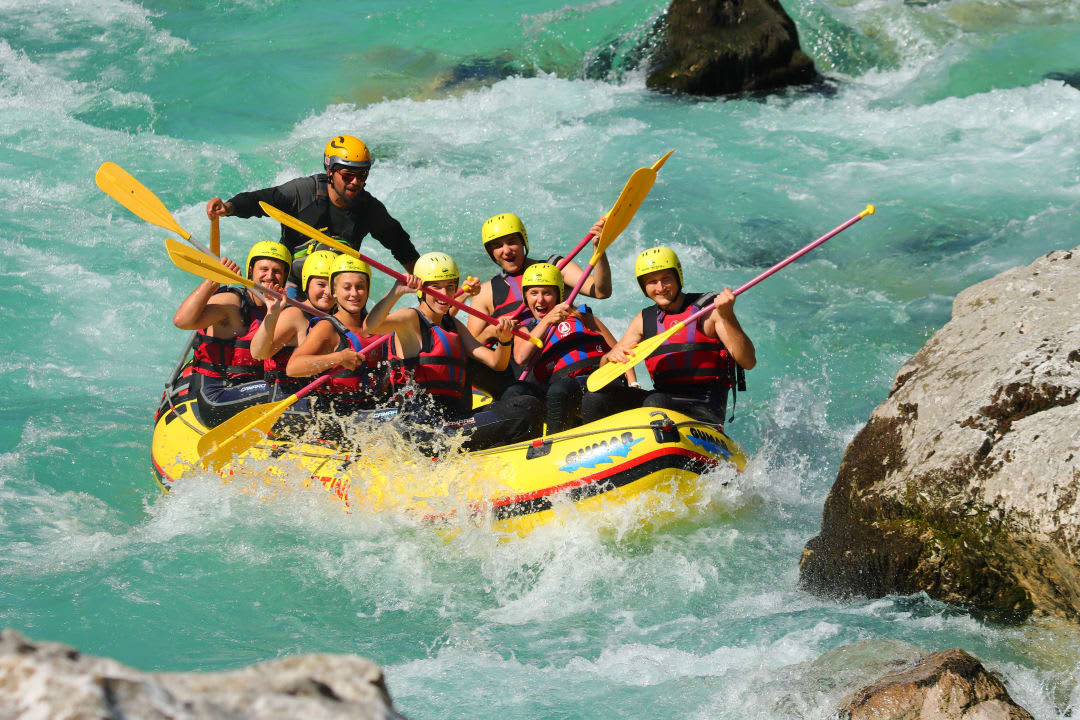 rafting down soca river near bovec