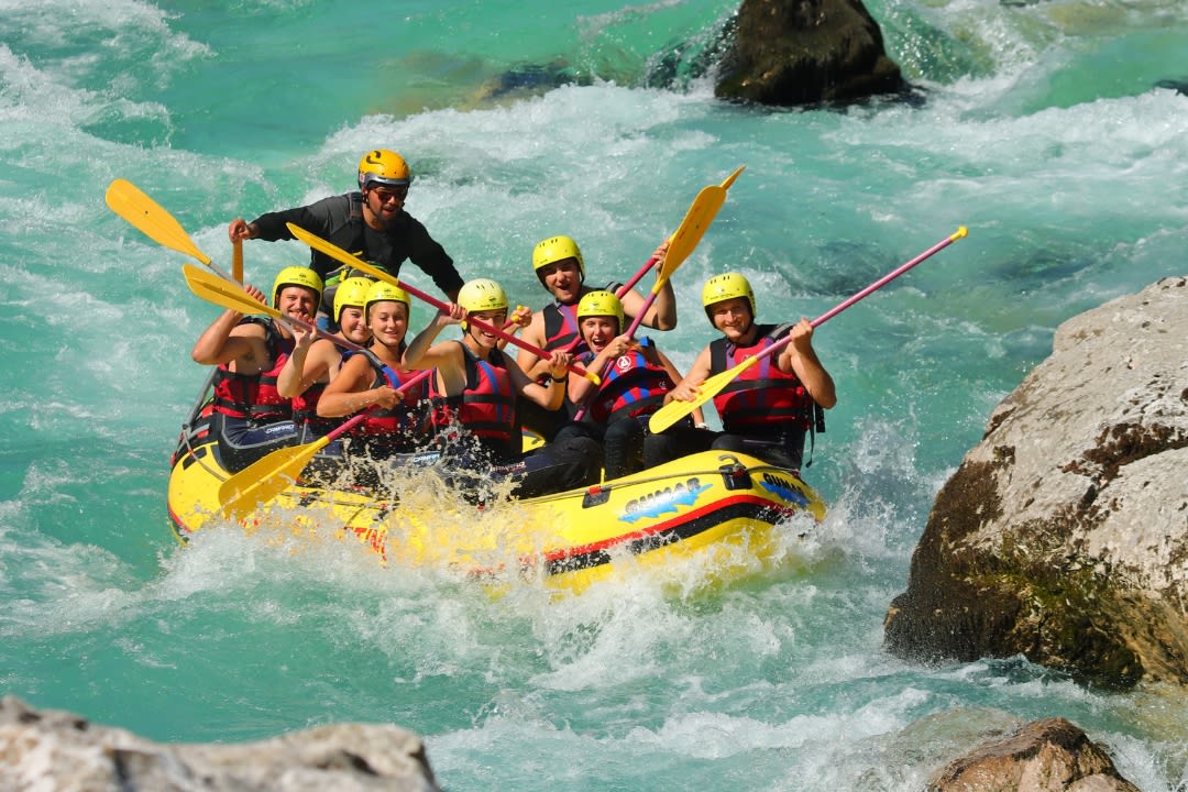 Friends doign Rafting Trip on the Soča River near Bovec