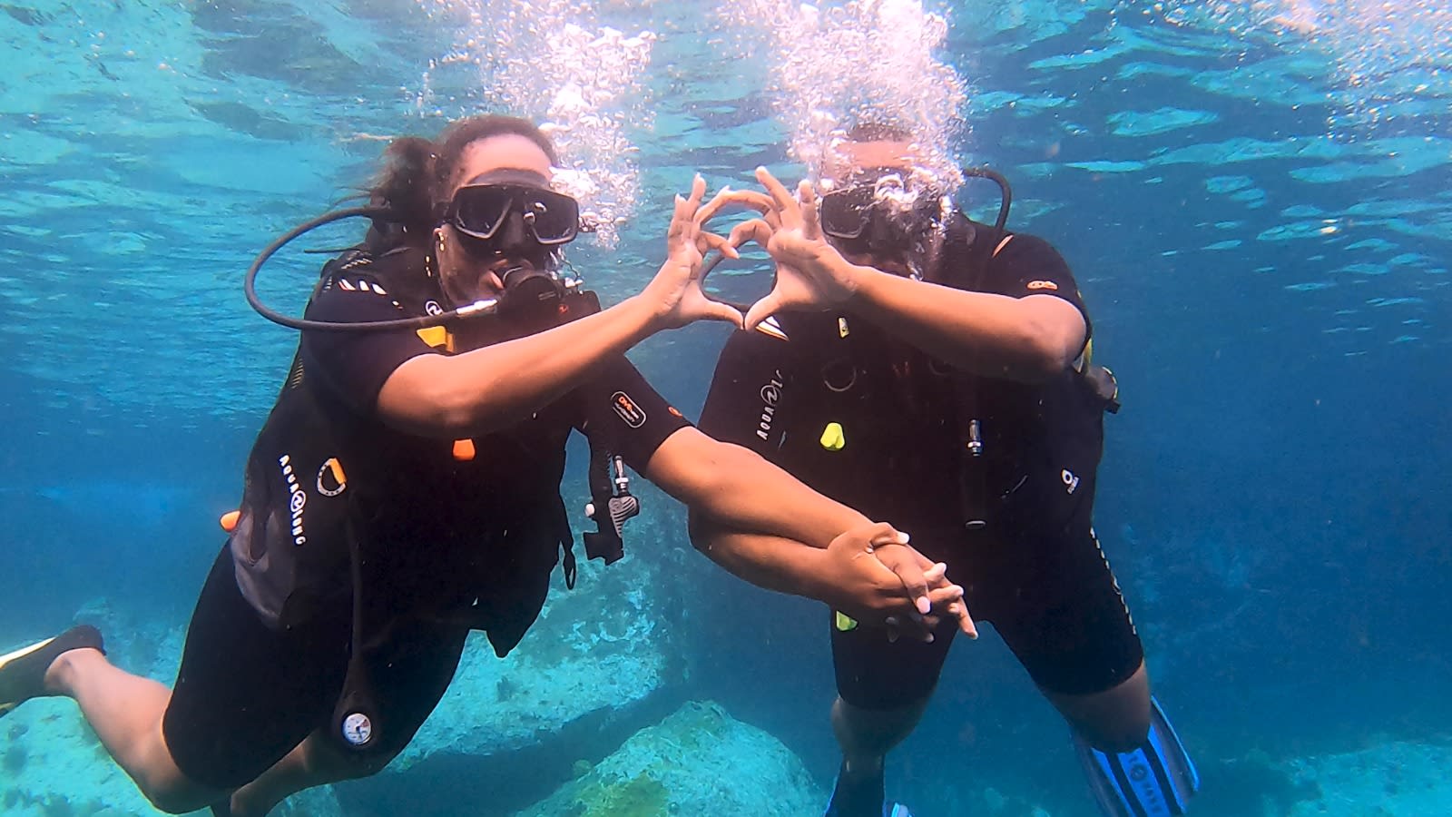 Couple scuba diving