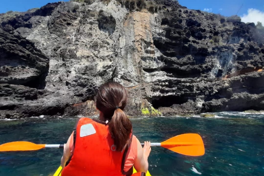 A girl doing Kayaking Excursion from Praia dos Moinhos in São Miguel, Azores