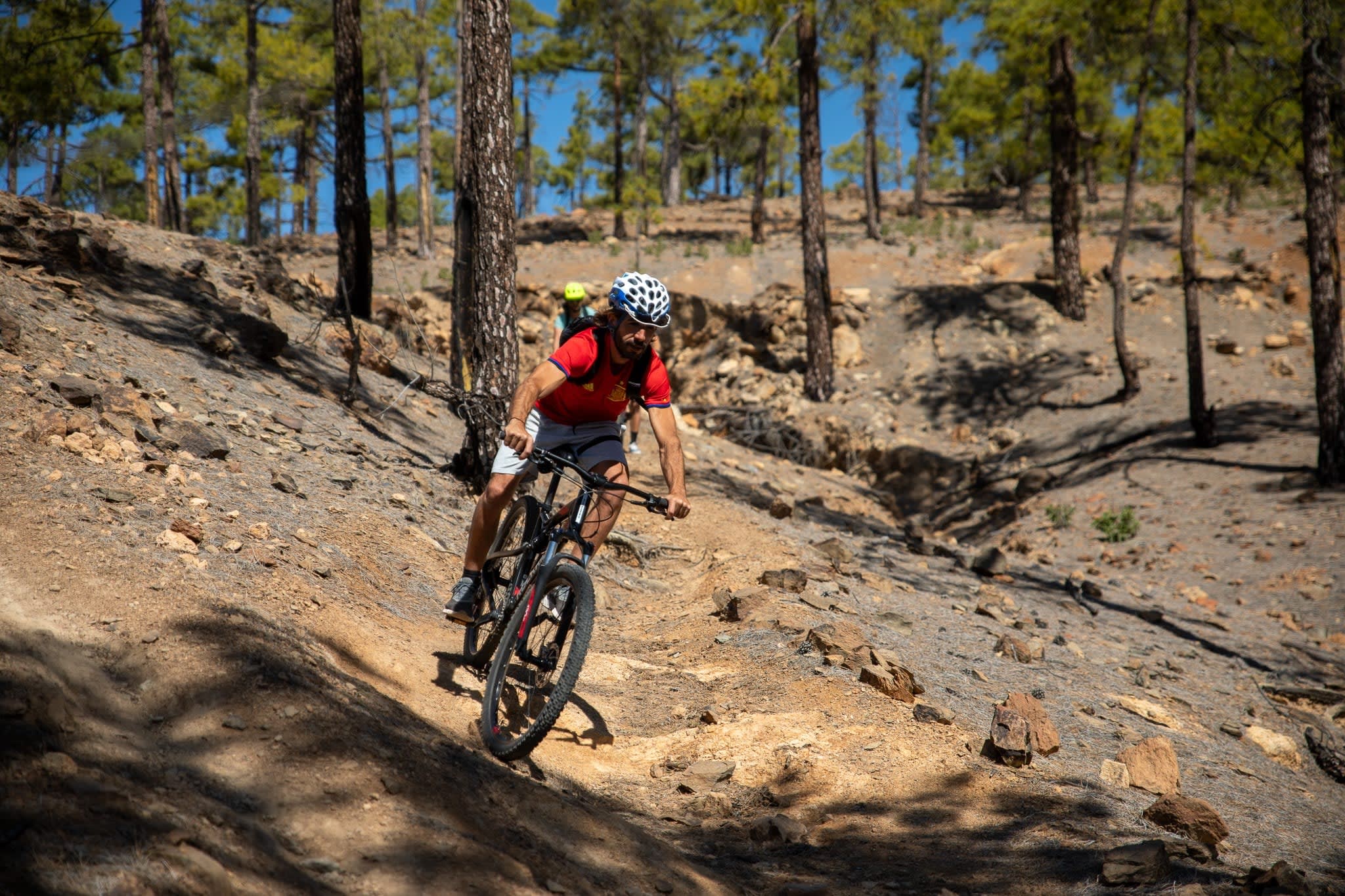 Man downhill on bike