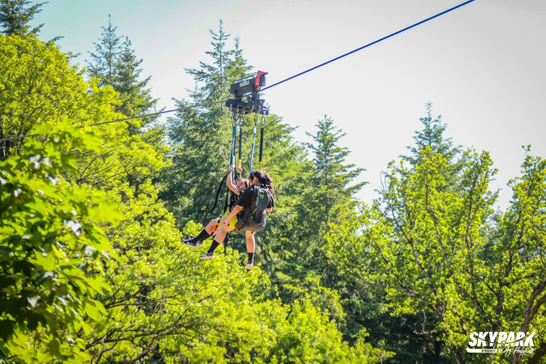 Girls on the giant zipline at SkyPark Normandie