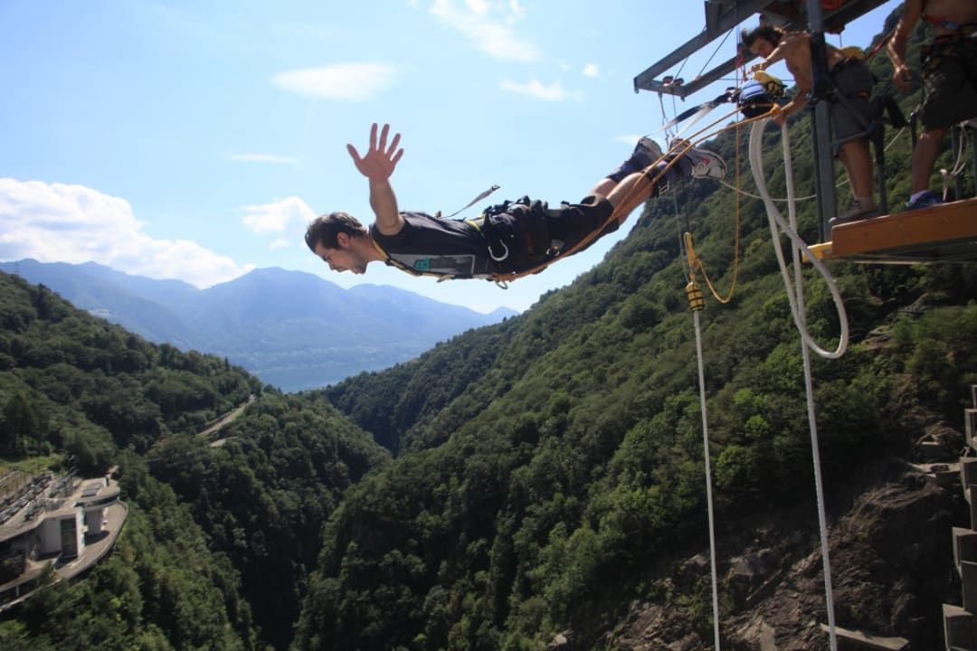 A man bungee jumping at the Verzasca Dam near Locarno