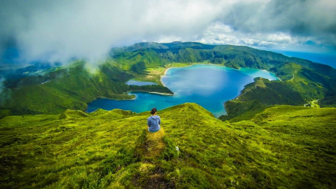 A woman admiring Azores landscapes
