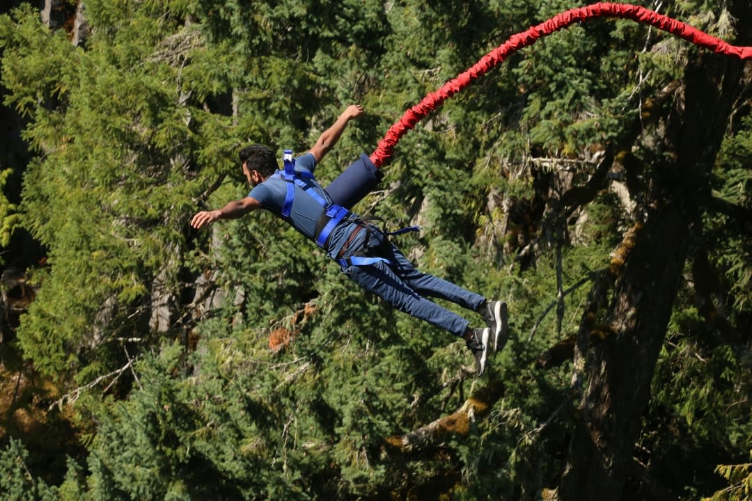 A man doing bungee jumping