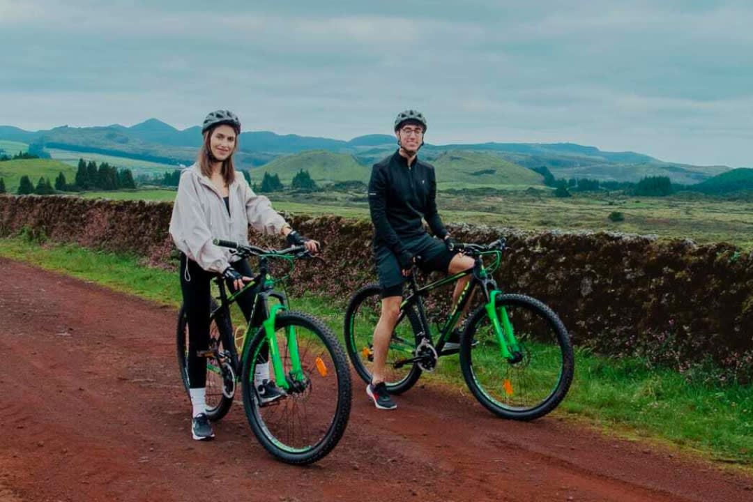 A couple doing bike tours in Terceira