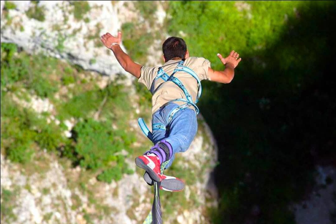 A man doing bungee jumping in 