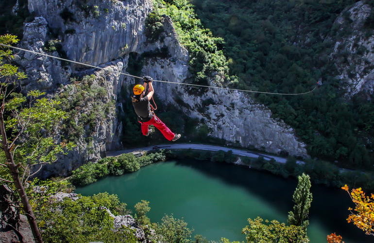 Zipline above the exceptionnal river and forest of Cetina in Croatia